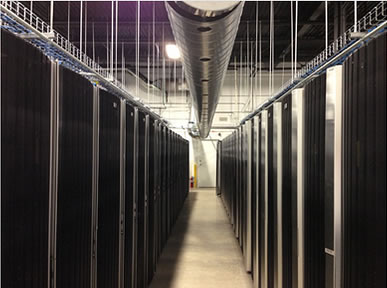 inside data centre showing rows of racks